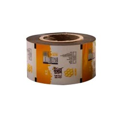 Ambalaj Miere Hartie Personalizata in Rola, Tipar 1-5 Culori, Latime Rola 200 mm, Hartie GK 70+PE 15+BOPP MET 20 g/m², Rola Hartie pentru Ambalat Miere Stick, Rola Hartie Ambalare Stickuri de Miere, Rola Hartie Ambalat Miere Plicuri